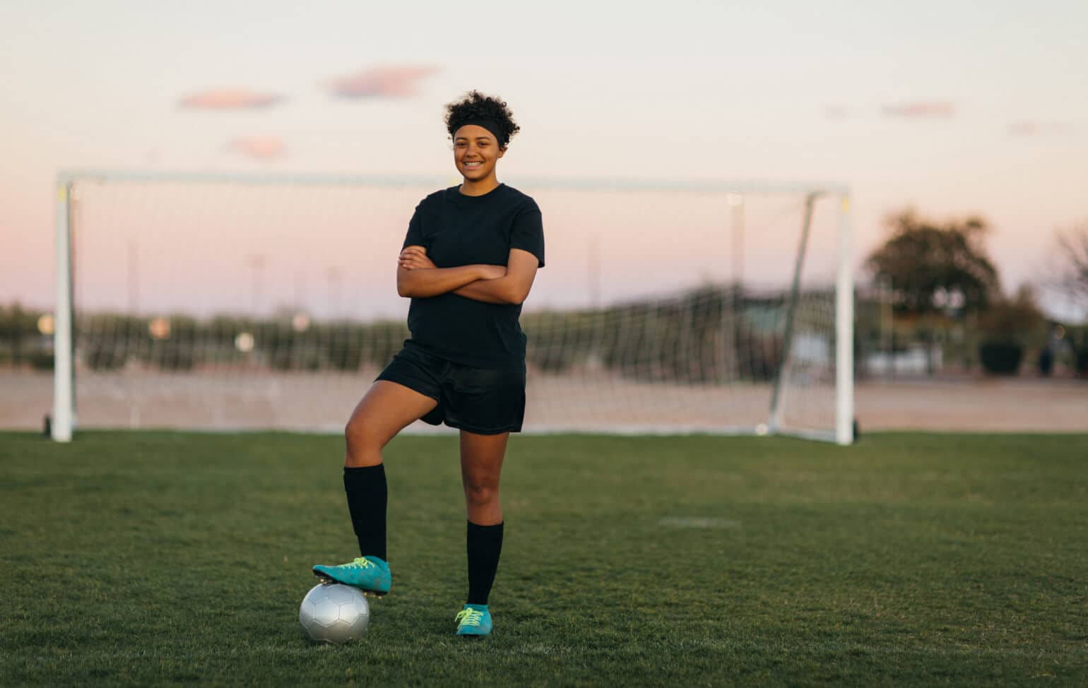 Student playing soccer